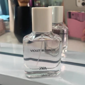 Merfume Violet Blossom + Gardenia'.