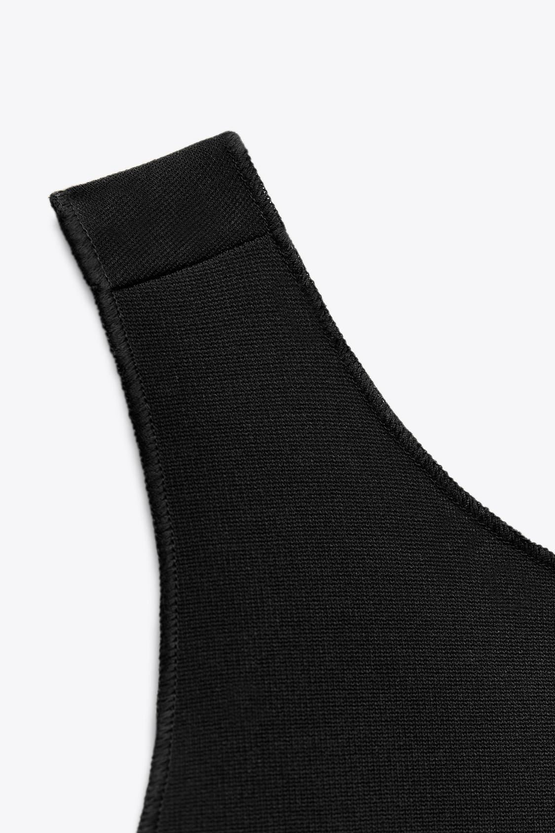 Stretch contouring dress with buckle.